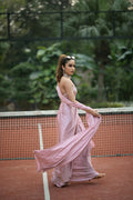 Soft Pink silk draped saree with a halter-neck 3D hand-embroidered blouse accented with crystals