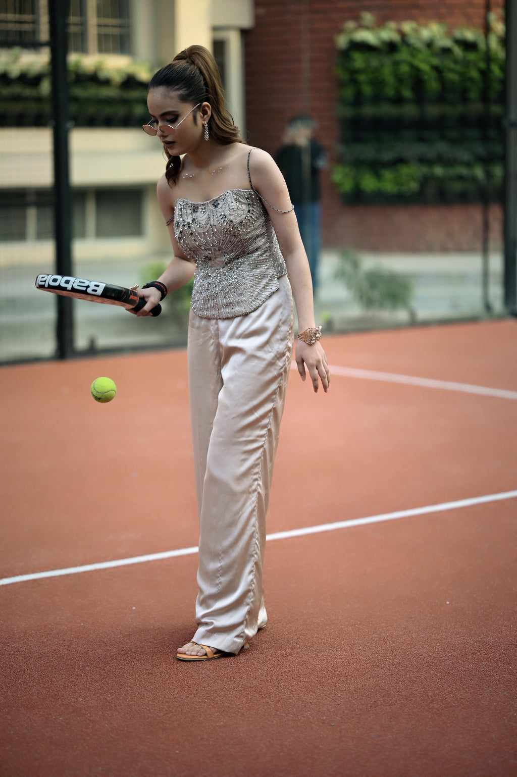 Soft Nude crystal hand-embroidered corset with a double-flap back, paired with satin pants