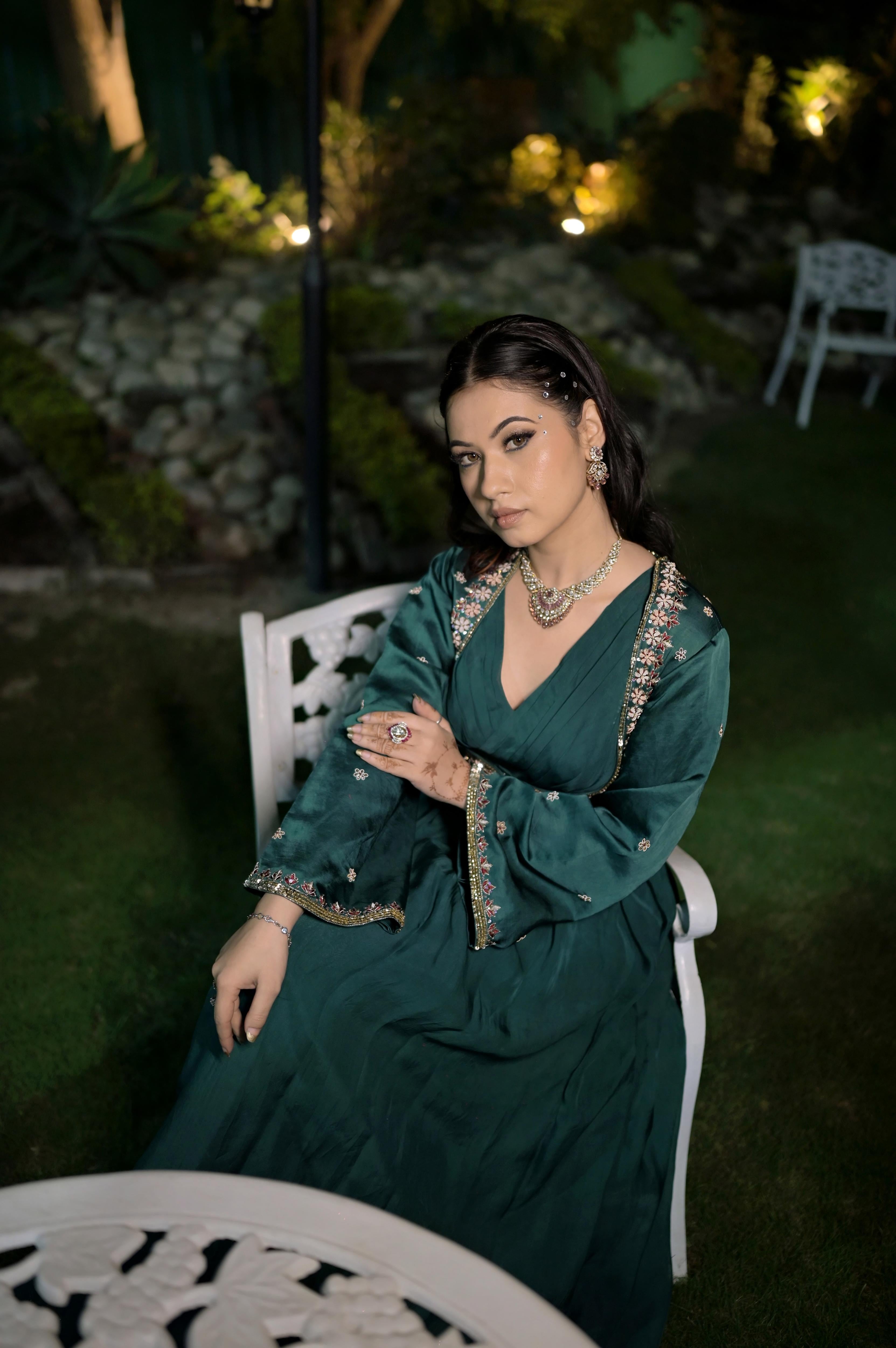 Emerald Green georgette dress paired with a traditional dabka-work jacket