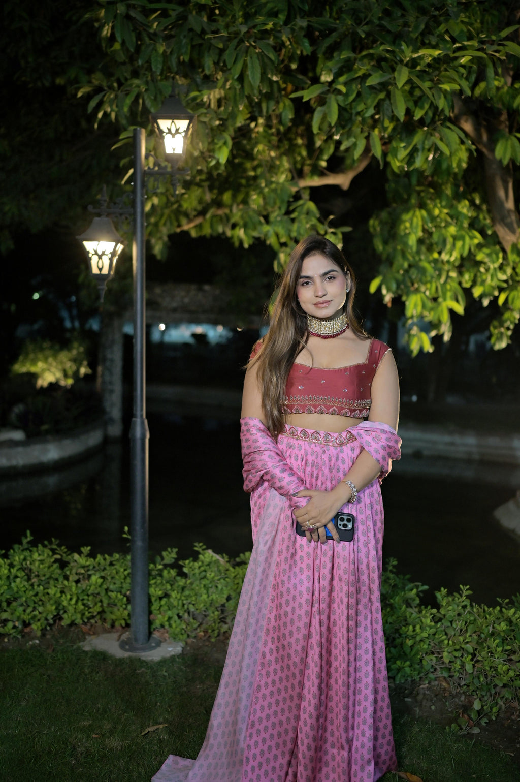 Hand-embroidered belt and blouse paired with a digital print saree