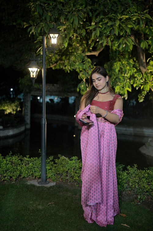 Hand-embroidered belt and blouse paired with a digital print saree
